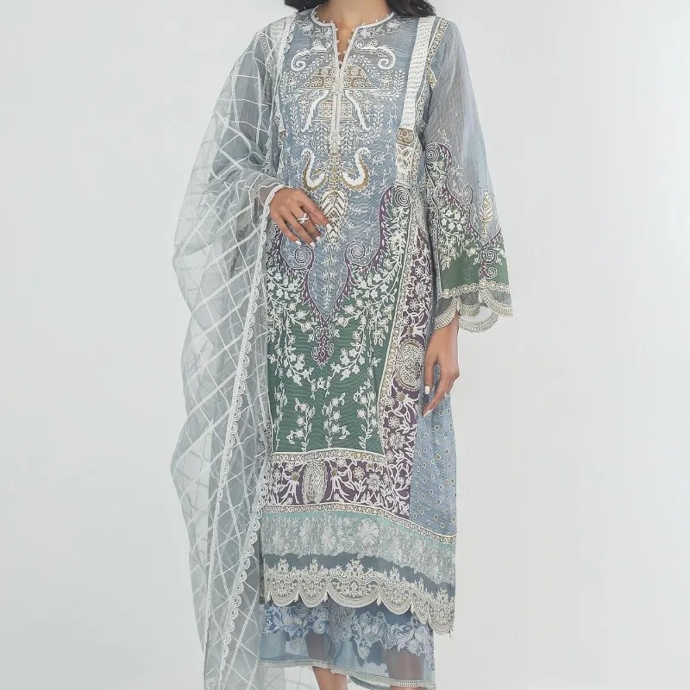 Beautiful embroidered dress by Sana Safinaz .